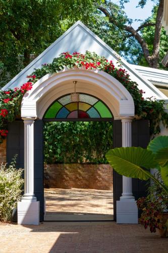 Courtyard Arched entrance at The Courtney Lodge, Victoria Falls