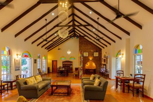 Lounge and Dining at The Courtney Lodge, Victoria Falls